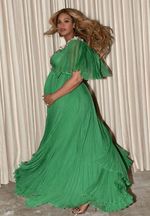  Beyonce looked amazing in a plunging green dress which flowed perfectly in the snaps