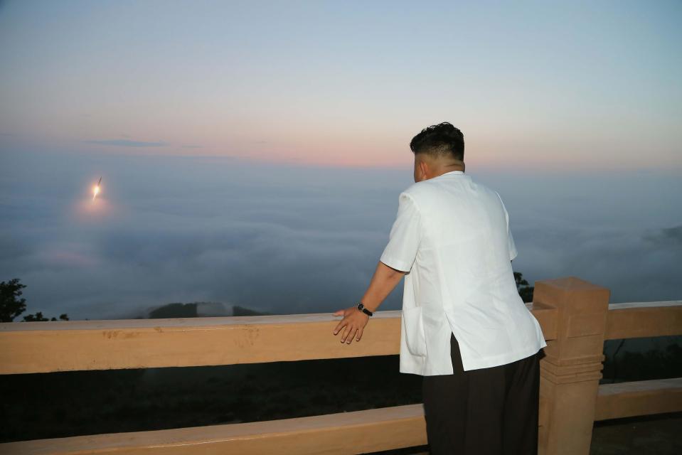  Tyrant Kim has been pictured watching his country test its latest ballistic missiles, sparking fears in the US and Asia