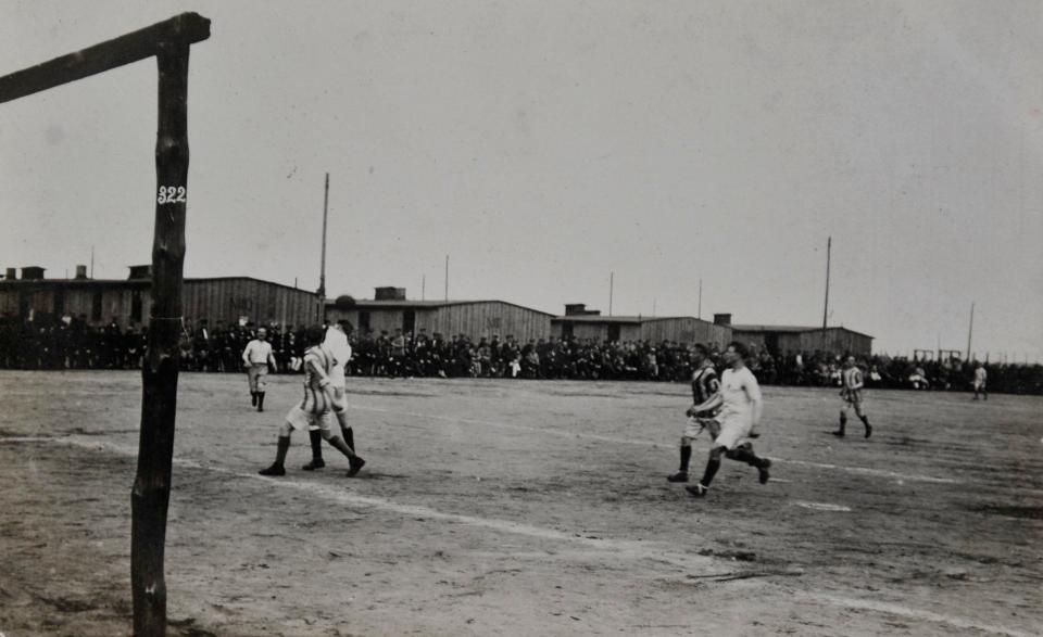  Captives enjoy a game of football in German camp