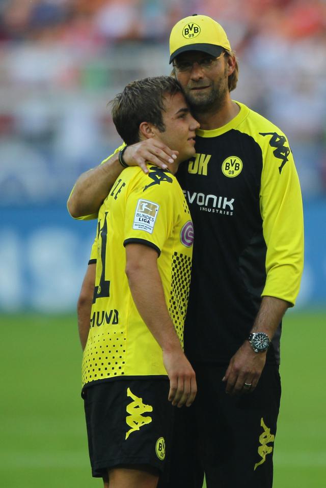  Jurgen Klopp with Mario Gotze after a 4-0 win over Augsburg in 2011