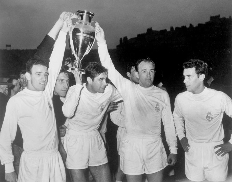  Real Madrid's Canario, Dominguez, Marquitos and Alfredo di Stefano hold the European Cup aloft, watched by teammate, captain Jose Zarraga after the final in 1960