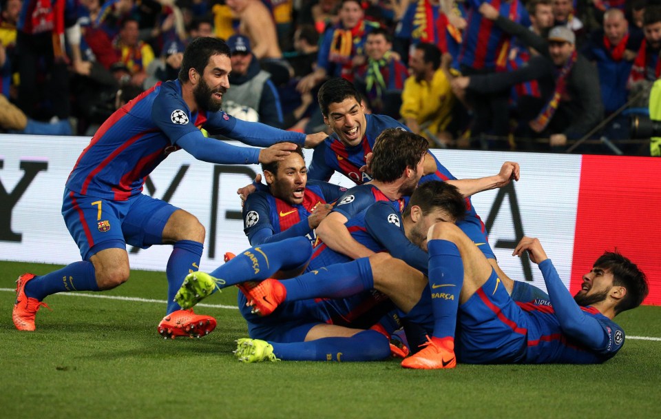 Barcelona players celebrate in the corner after Sergi Roberto's last-gasp goal