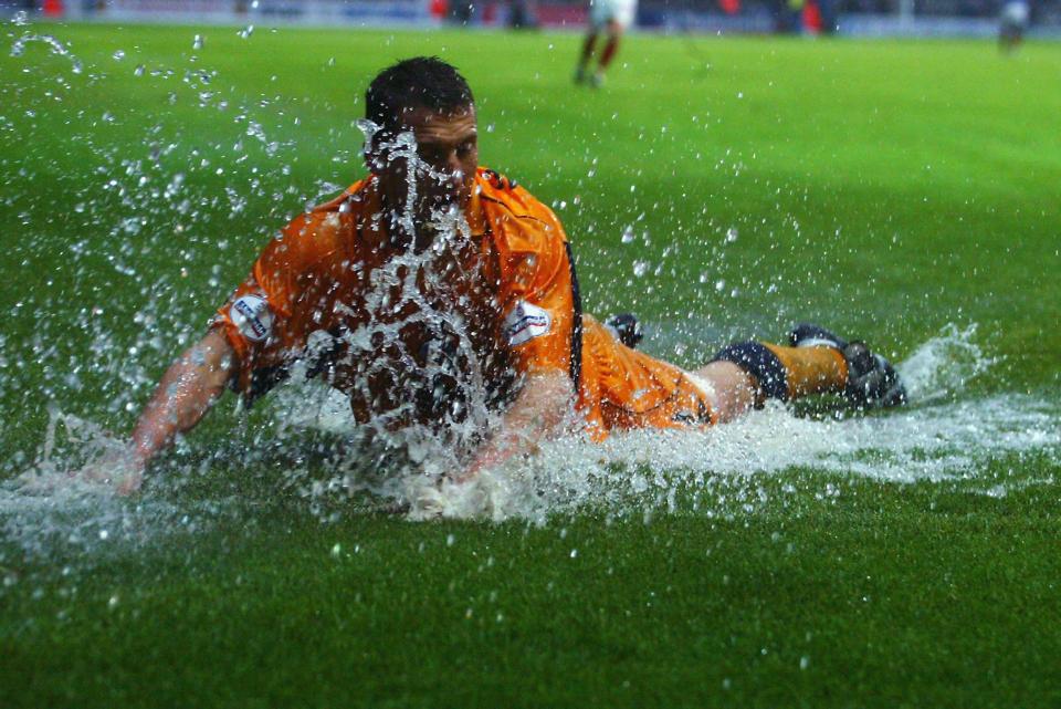  Billy McKinlay can almost go for a swim during the match at Fratton Park