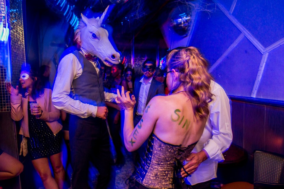 One snap shows a man in a unicorn head with a girl with ‘sin’ painted on her back