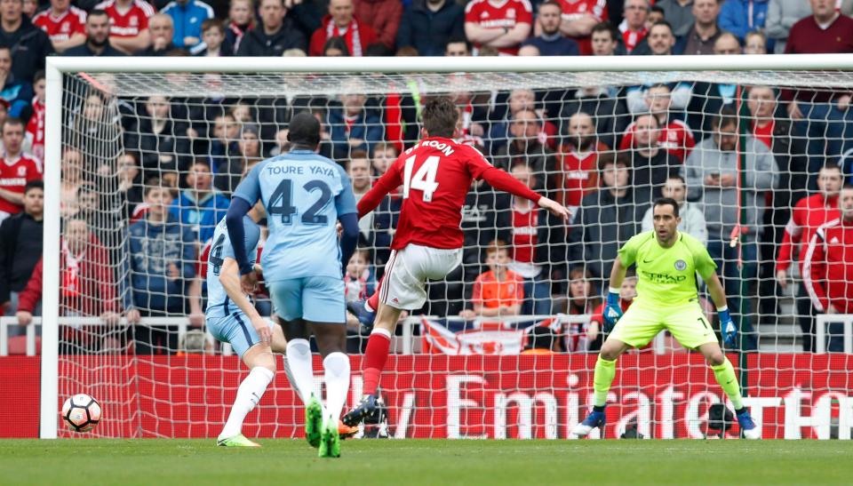  Marten de Roon lashed in a shot as Middlesbrough try to find a way back into the game