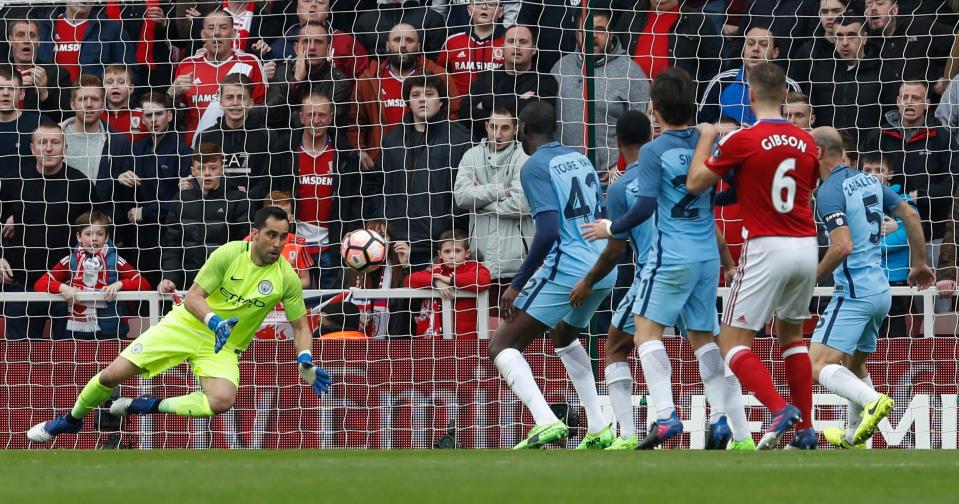  Claudio Bravo spills the ball and is saved as Pablo Zabaleta clears off the line