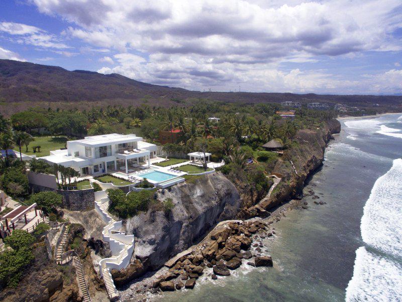 The oceanfront villa on the Punta de Mita, Mexico, has an outdoor balcony with an infinity pool