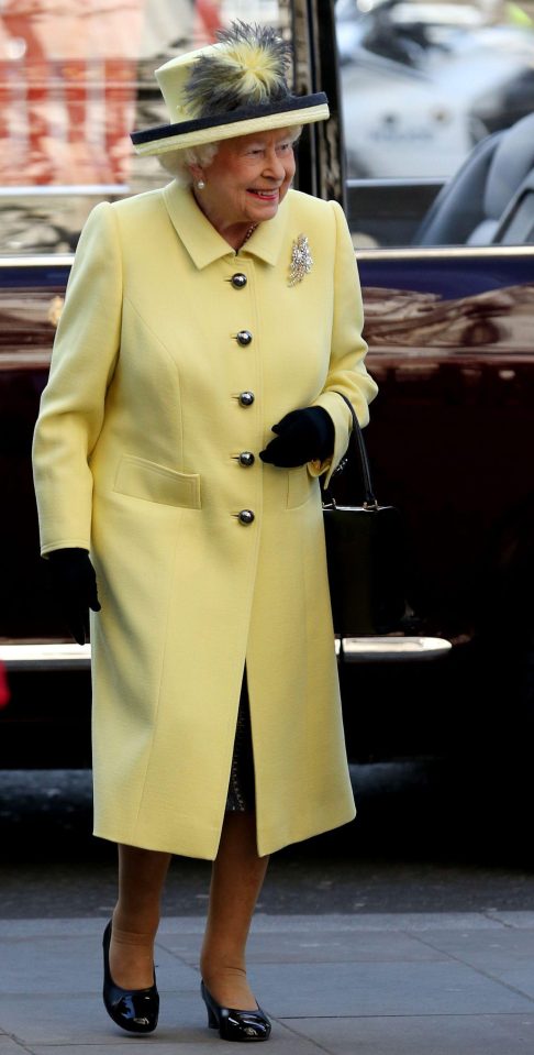  Radiant in yellow ... the Queen beamed as she attended the Commonwealth Day service on Monday