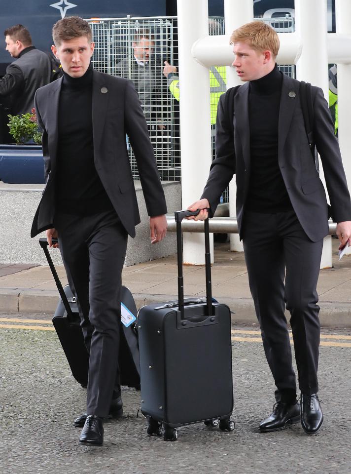  John Stones and Kevin De Bruyne arrive at Manchester Airport today