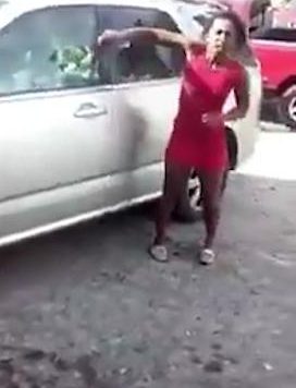  She smashes the drivers side window in the shocking footage