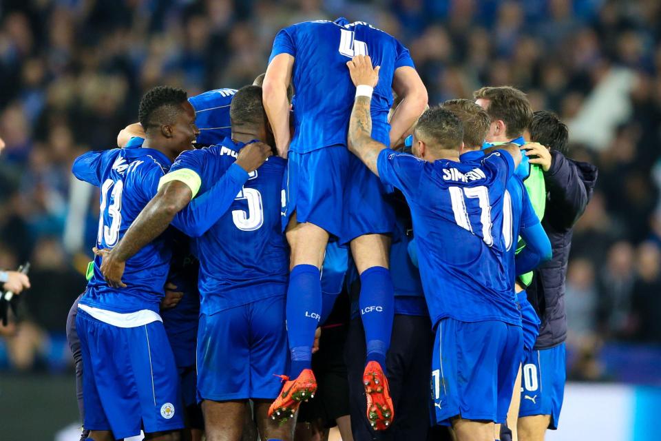  The Leicester players celebrate after making history