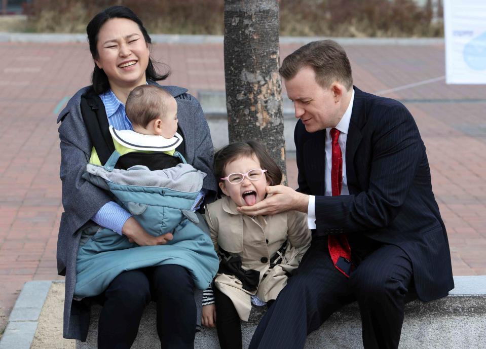  Jung-a Kim and Robert Kelly with their adorable tots Marion and James. Prof Kelly said his kids were not punished