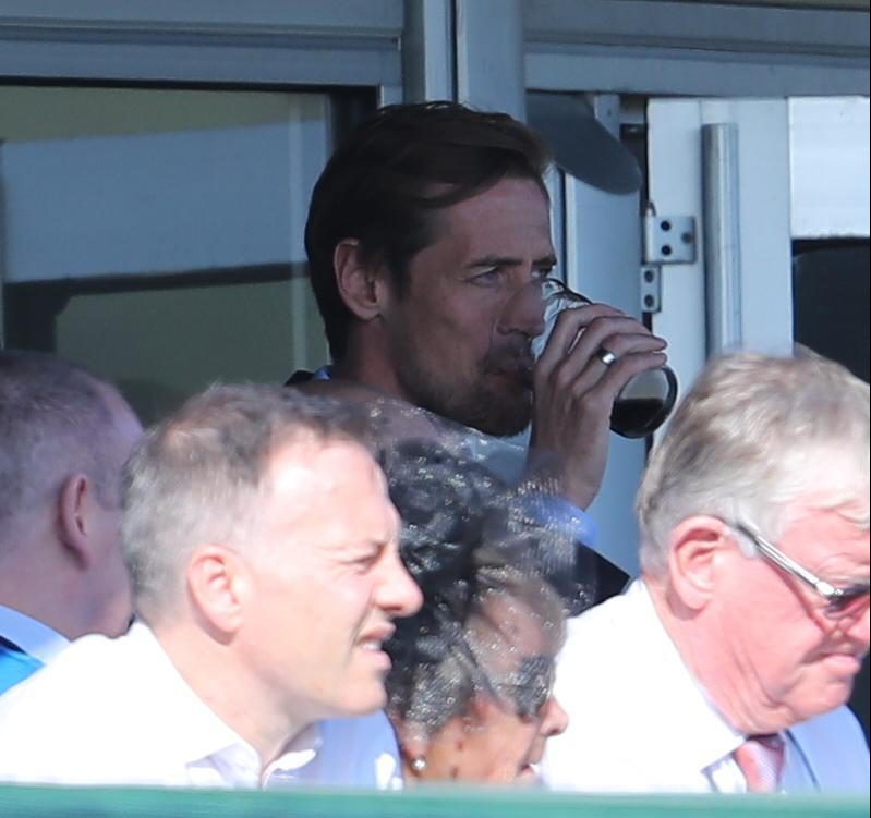 Peter Crouch was snapped knocking back what looked like a pint of Guinness at the Cheltenham Festival