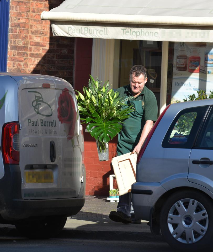  Paul Burrell was spotted leaving his florists with a single rose and bouquet of lilies