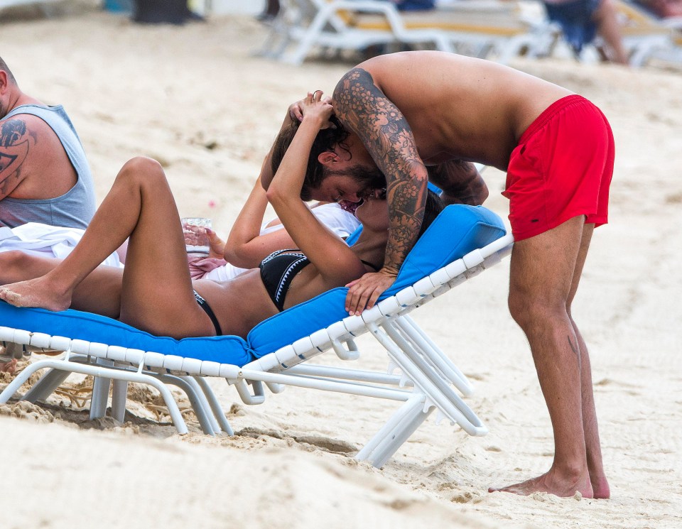 The loved up couple are enjoying a sun-drenched holiday in Barbados