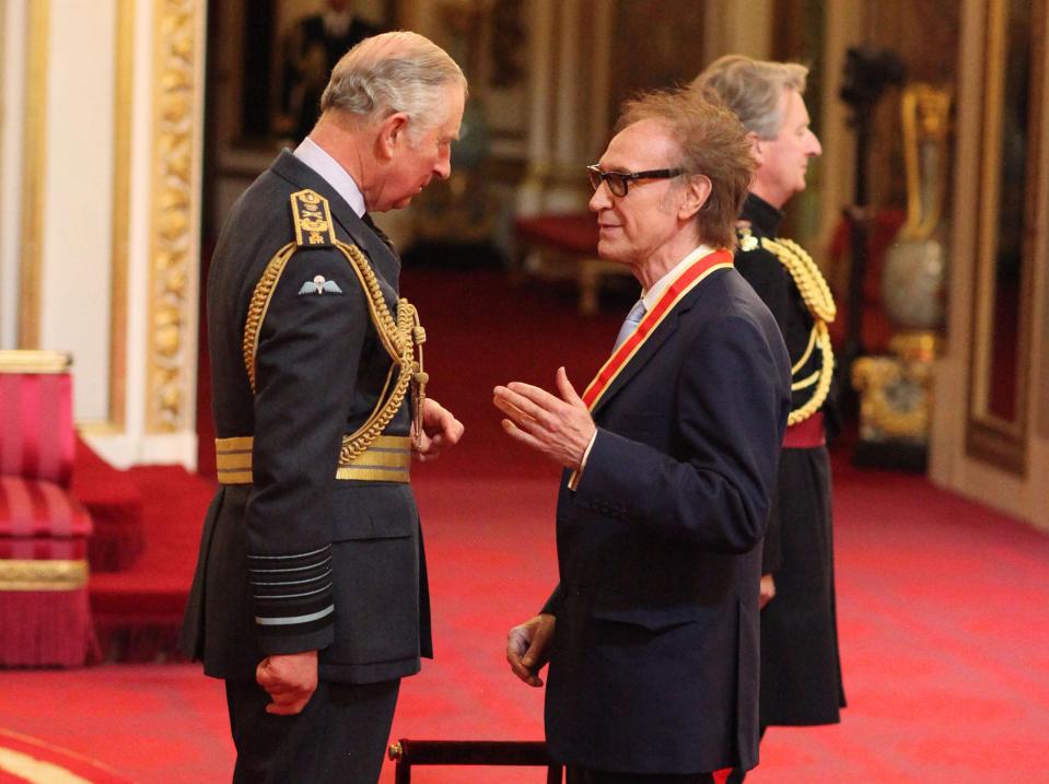  Newly knighted Sir Ray chats with the royal at Buckingham Palace after receiving the award