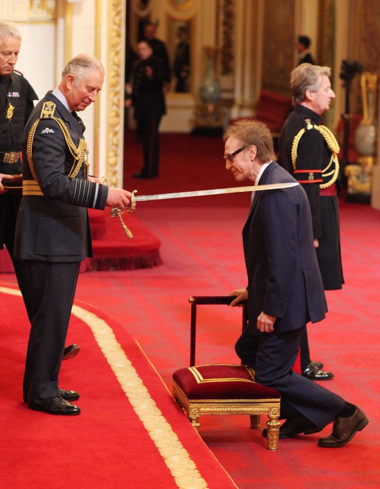  Arise Sir Ray... The 72-year-old Kinks front man is knighted by Prince Charles