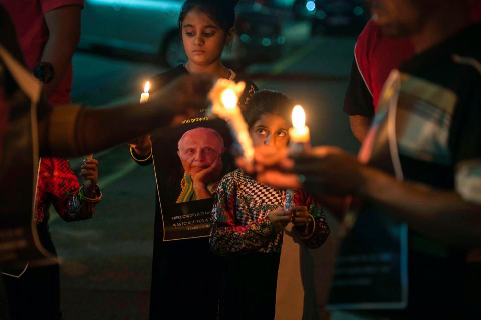  People hold candles as they gather for a night vigil to pray for Anti Apartheid struggle veteran and Rivonia trialist Ahmed Kathrada currently ill in hospital last week