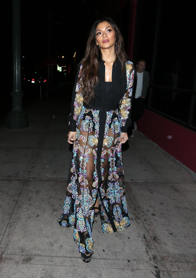 Just hours earlier the singer turned heads as she arrived at Beso restaurant in Hollywood, showcasing her sartorial savvy in a colourful outfit