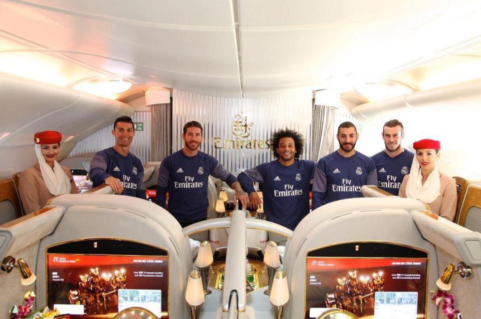  The players pose at the front of the plane