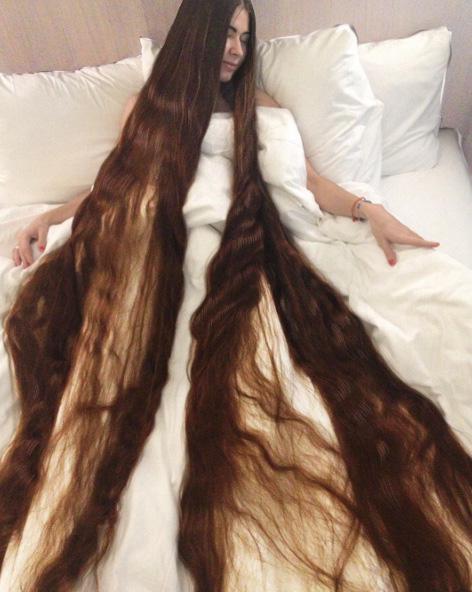  Husband Ivan says he sees his wife’s hair as another family member, even if it does limit his space to stretch out in the marital bed