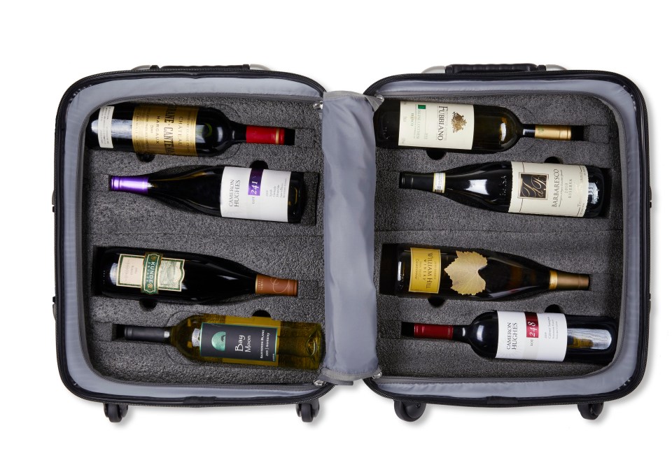 The VinGardeValise is a durable suitcase designed to protect an entire case of wine