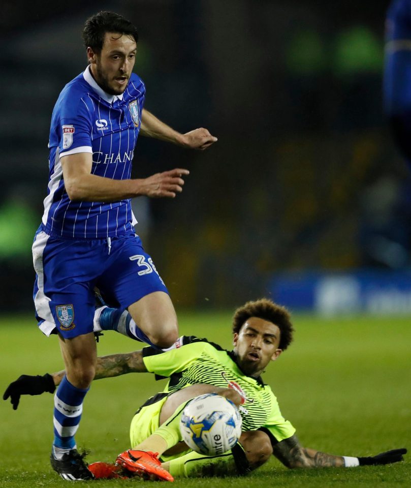  Wednesday's William Buckley in action with Reading's Daniel Williams