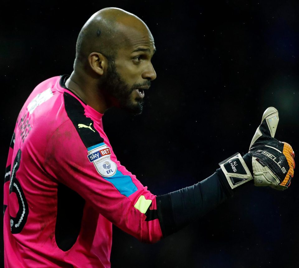  Ali Al-Habsi gives the thumbs up to Reading fans after his fine performance