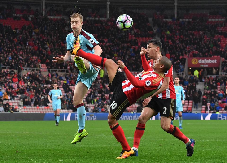  Burnley's Ben Mee in action with Sunderland's Wahbi Khazri this afternoon