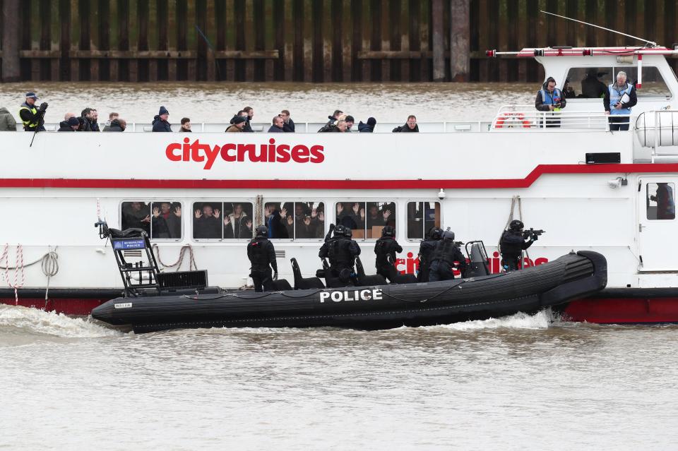  They surrounded the boat as panicked passengers pressed themselves up against the glass