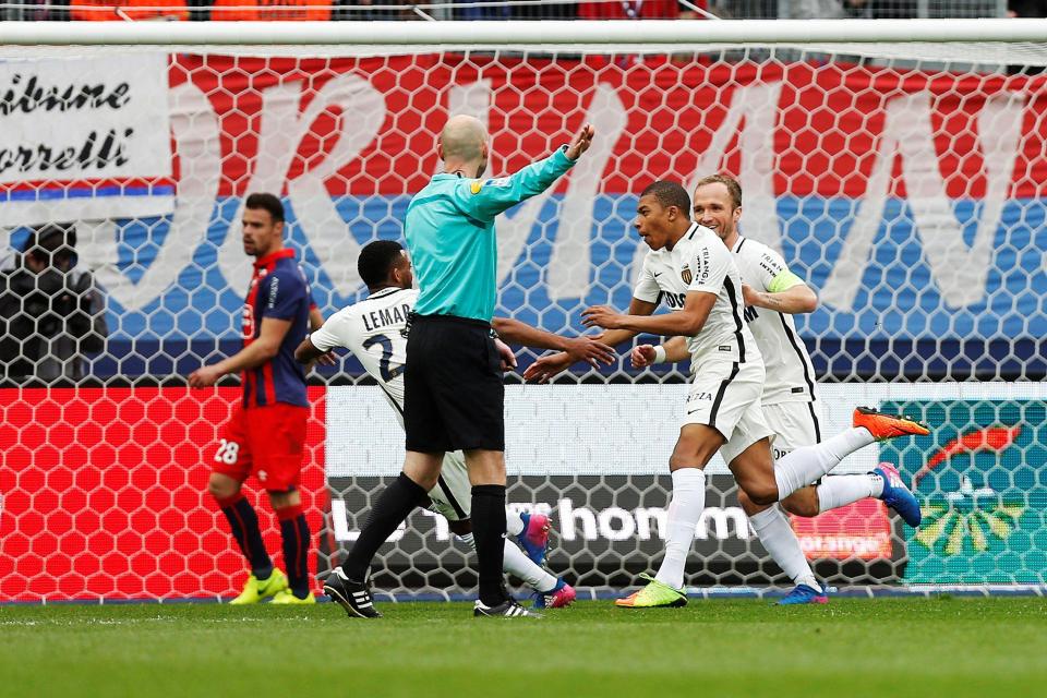 Kylian Mbappe celebrates netting Monaco's first goal of the game against Caen