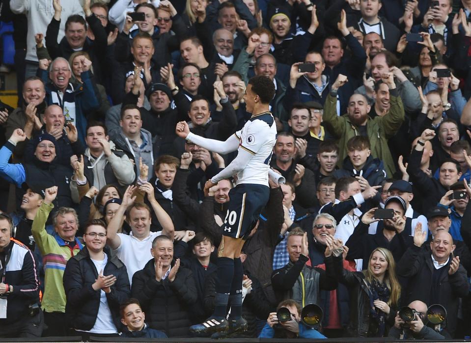  Dele Alli celebrates with the Tottenham fans