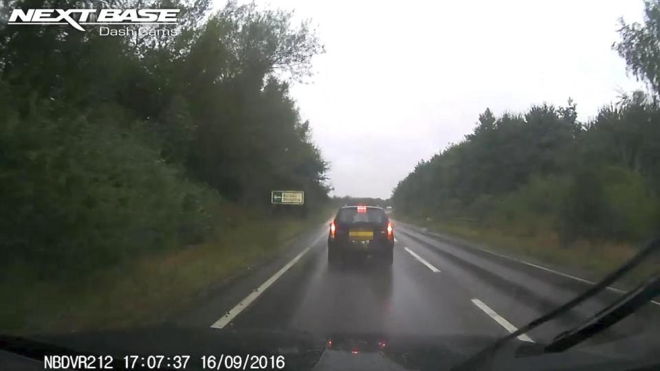  The other driver suddenly slams on the brakes on the wet road