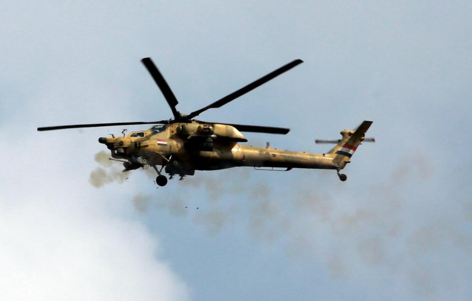  An Iraqi Army, Russian-built Mi-28 attack helicopter fires on ISIS positions