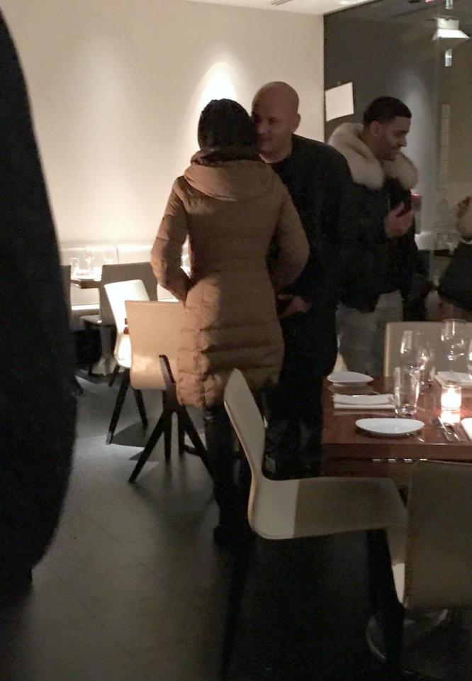  He was seen holding her hand and putting his arm around her waist according to an onlooker