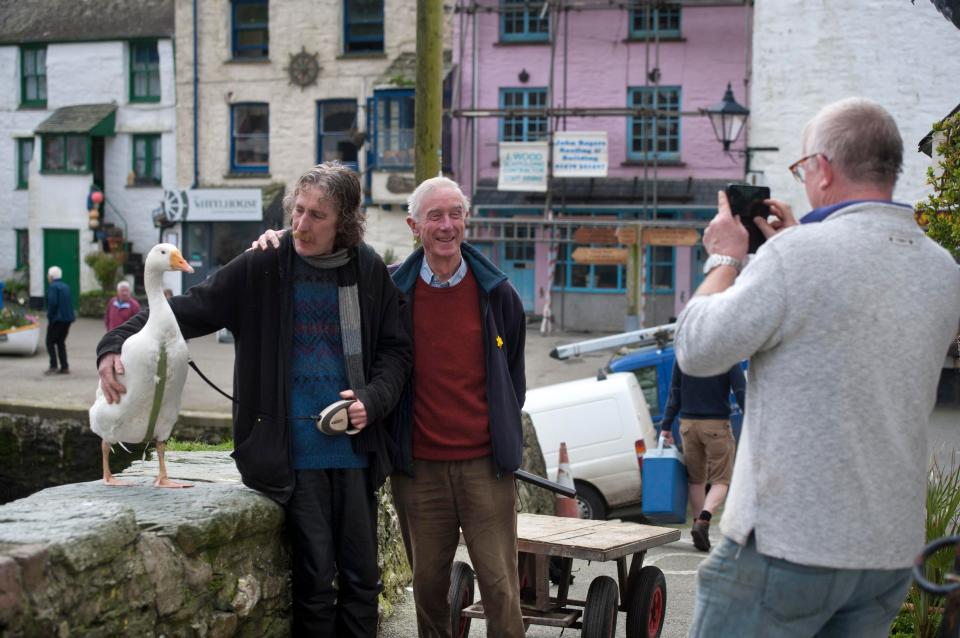  Say cheese ... the pair are often asked to pose for pictures by locals and tourists