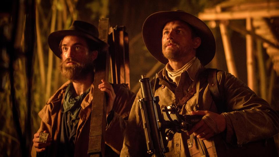  Charlie Hunnam (right) plays Fawcett and Robert ­Pattinson stars as one of his exploration party, ­corporal Henry Costin