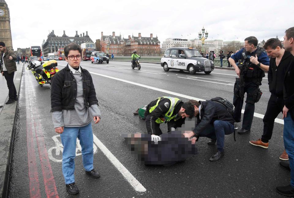  Bloodied victims lie injured on the ground in Westminster