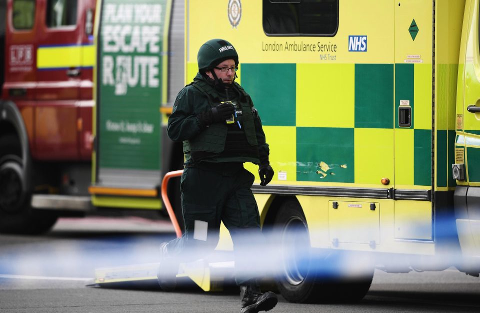  An armed paramedic arrives at the scene in Westminster