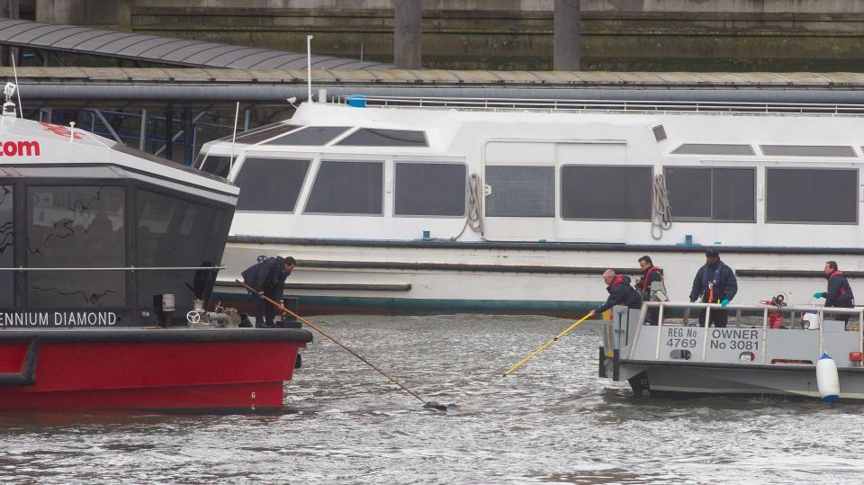  Officers trawl the Thames after the terror attack in Westminster