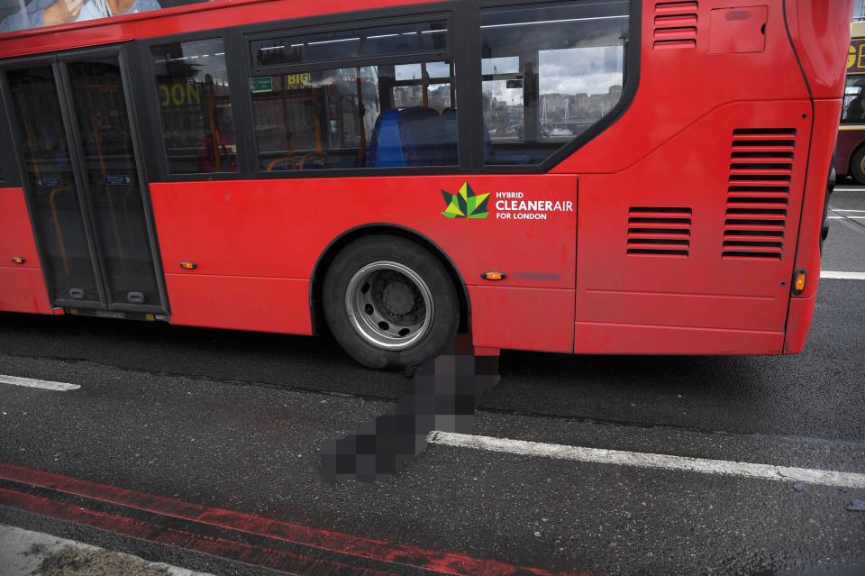  A woman trapped under a bus after the attack in London