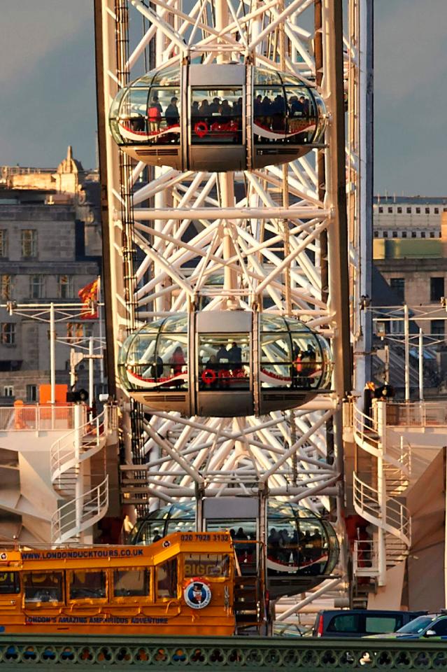  Waiting with bated breath ... tourists were kept on the London Eye while police dealt with terror attack in Westminster