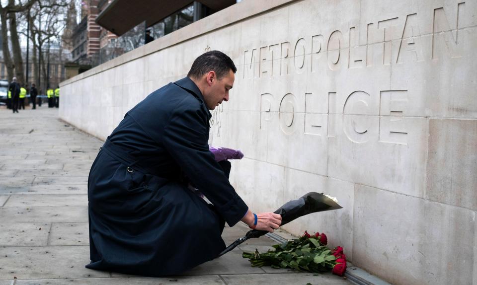  Flowers are laid outside New Scotland Yard after Pc Keith Palmer was killed in the Westminster attack