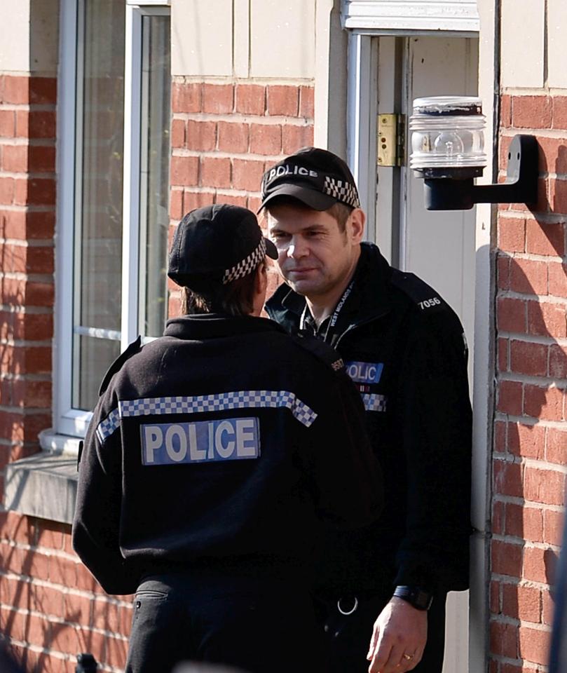  Officers holding a battering ram raided the property in Birmingham