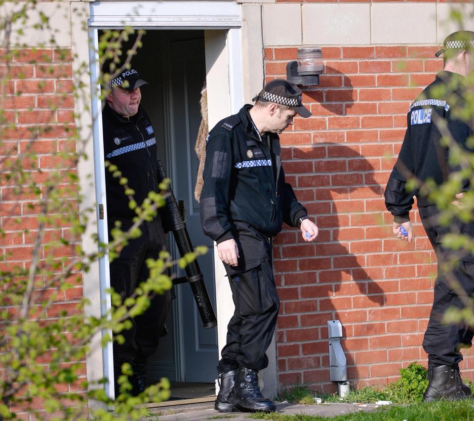  Police leaving the property at the Quayside, in the Winson Green area of Birmingham after carrying out a forensic search