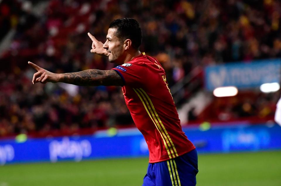 Spain's Vitolo was the other scorer and he celebrates his goal here