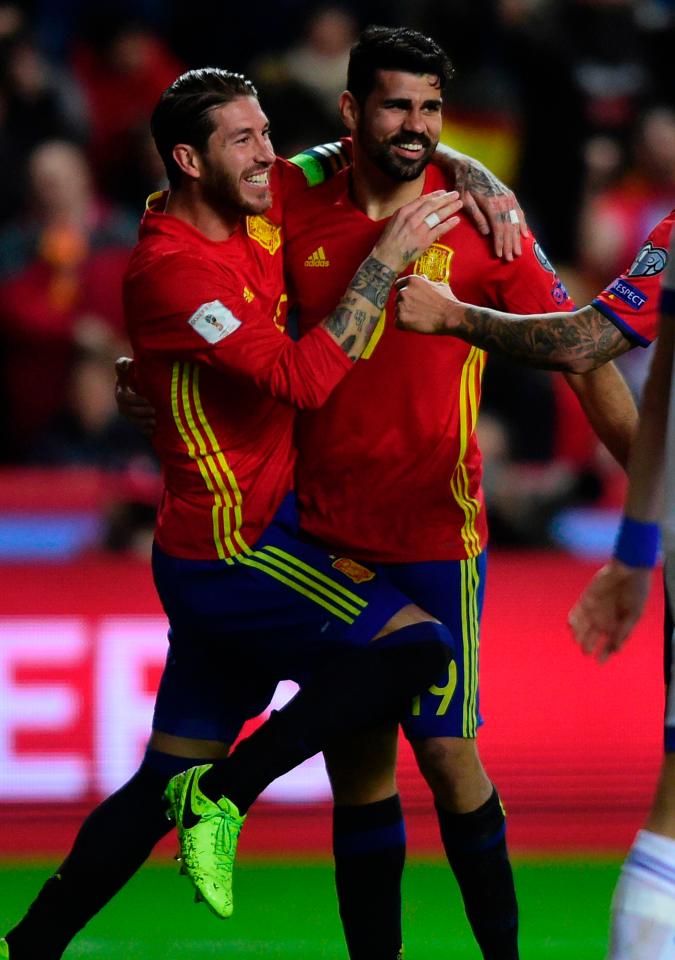 Sergio Ramos congratulates Diego Costa who scored the third for the Spaniards