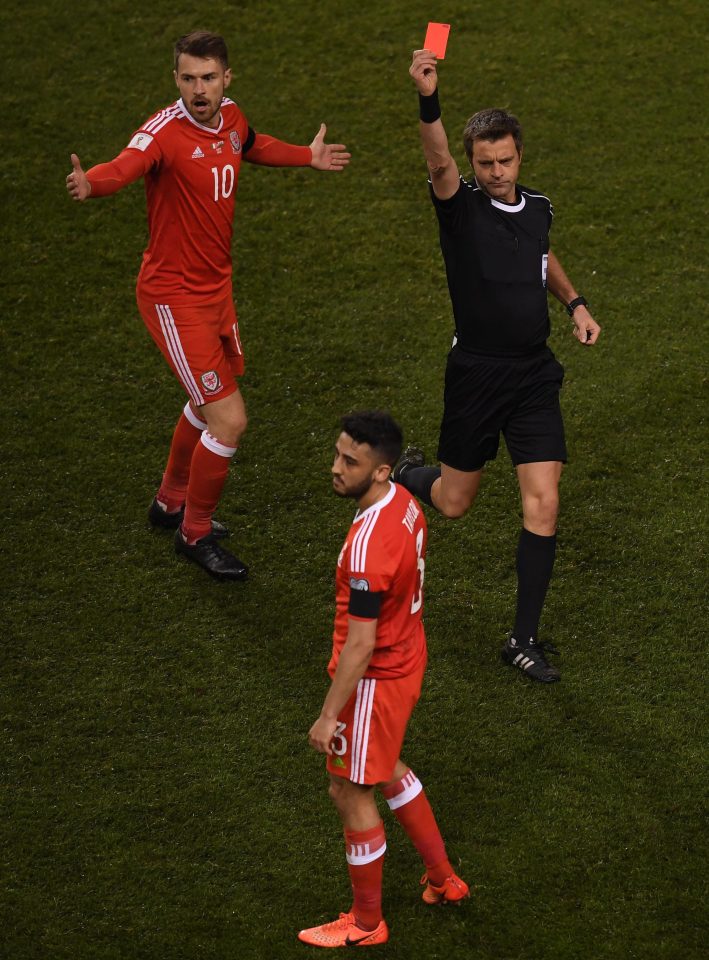  Neil Taylor was red carded for his horror tackle