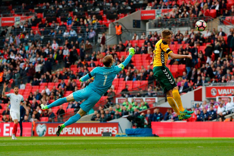  Joe Hart was beaten to the ball but the Lithuania player was miles offside