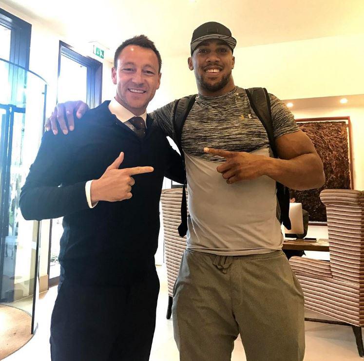  Chelsea's John Terry poses with the 'monster of a man' Anthony Joshua